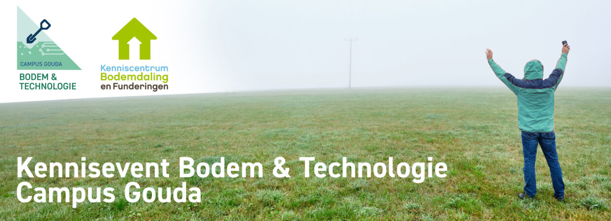 Rear view of man in red jacket standing on a green meadow and raising his arms in joy in front of a foggy nowhere landscape. Seen in October in Germany, Bavaria near Oedenberg.